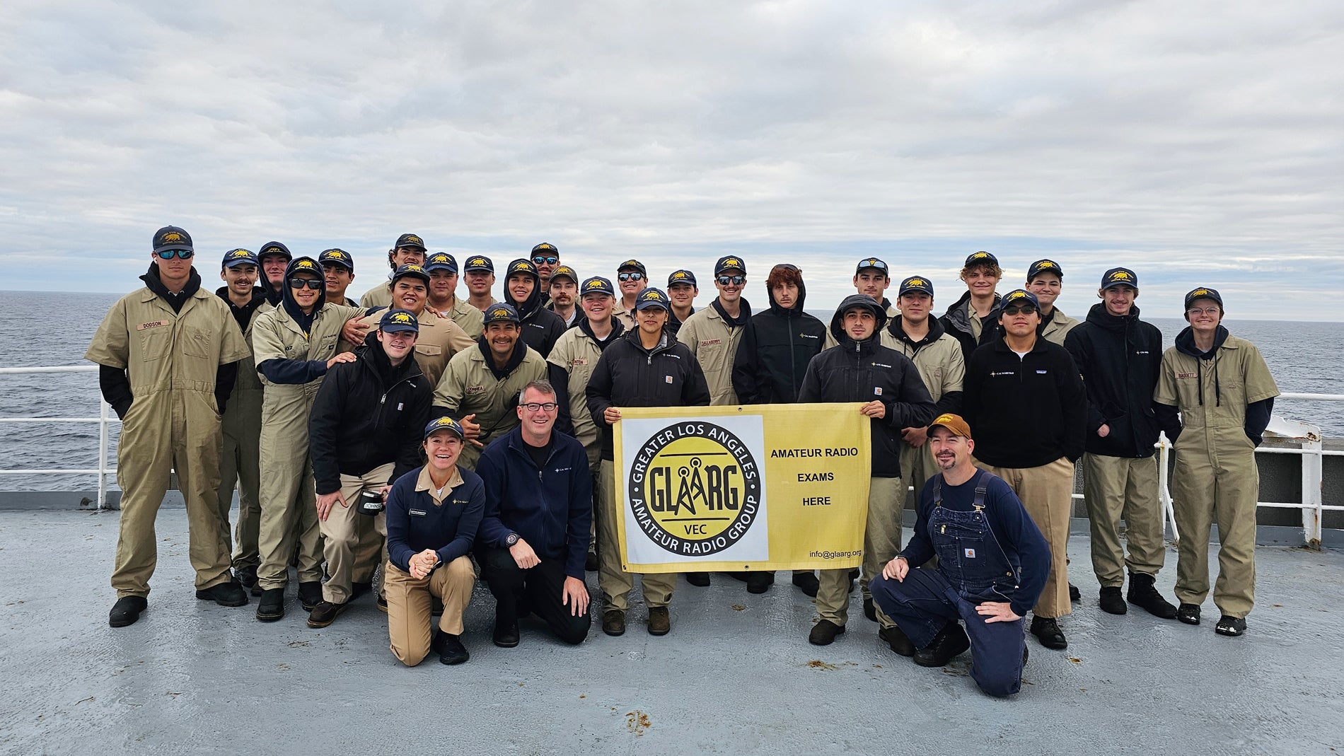 Amateur radio competitor pose on deck