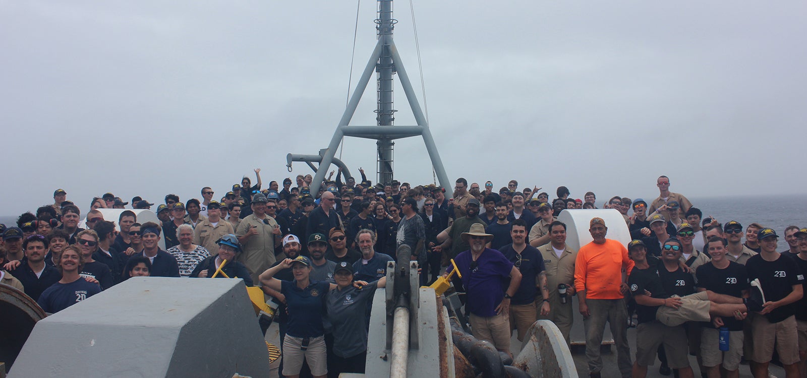 The Summer Sea Term crew on deck of the Training Ship Golden Bear.