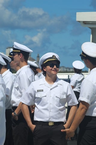 Cadets gather casually on the deck of TS Golden Bear