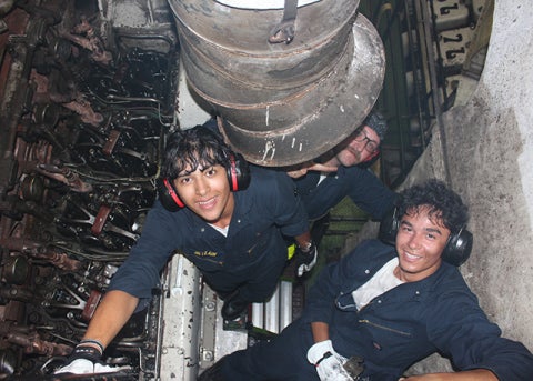 Engineering cadets gain hands-on experience in the engine room.