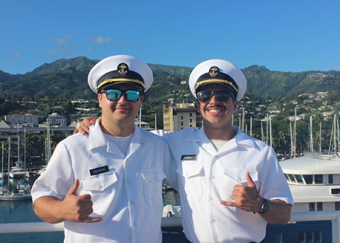 Cadets celebrate arriving in Tahiti after 17 days at sea.