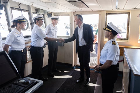 Gov. Gavin Newsom greeting cadets aboard the Training Ship Golden Bear.