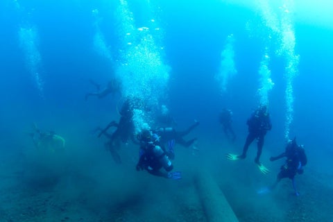 SCUBA club divers underwater.