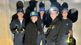 Cadets in the ballast tank of Training Ship Golden Bear