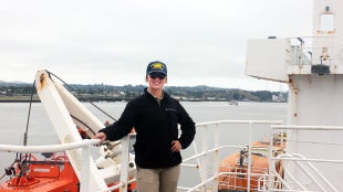 Cadet Paige Boehlert on deck of the Training Ship Golden Bear.
