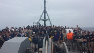 The Summer Sea Term crew on deck of the Training Ship Golden Bear.