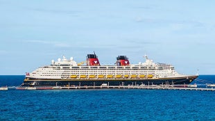 A Disney cruise ship at sea.